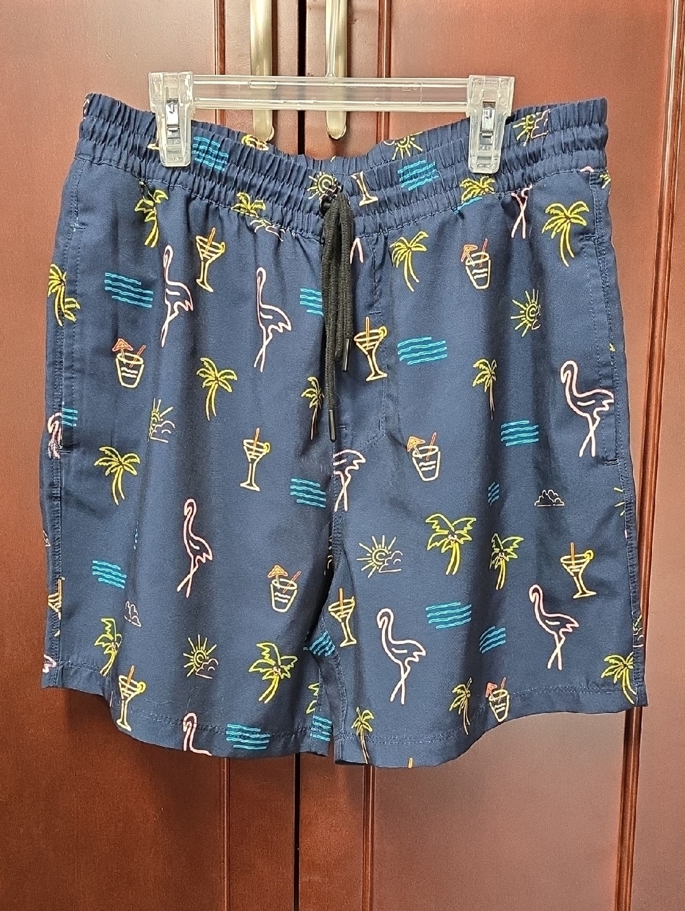 HOST PICK. Like New. Men's Momentum Navy Tropical Print Swim Trunks. Size Medium